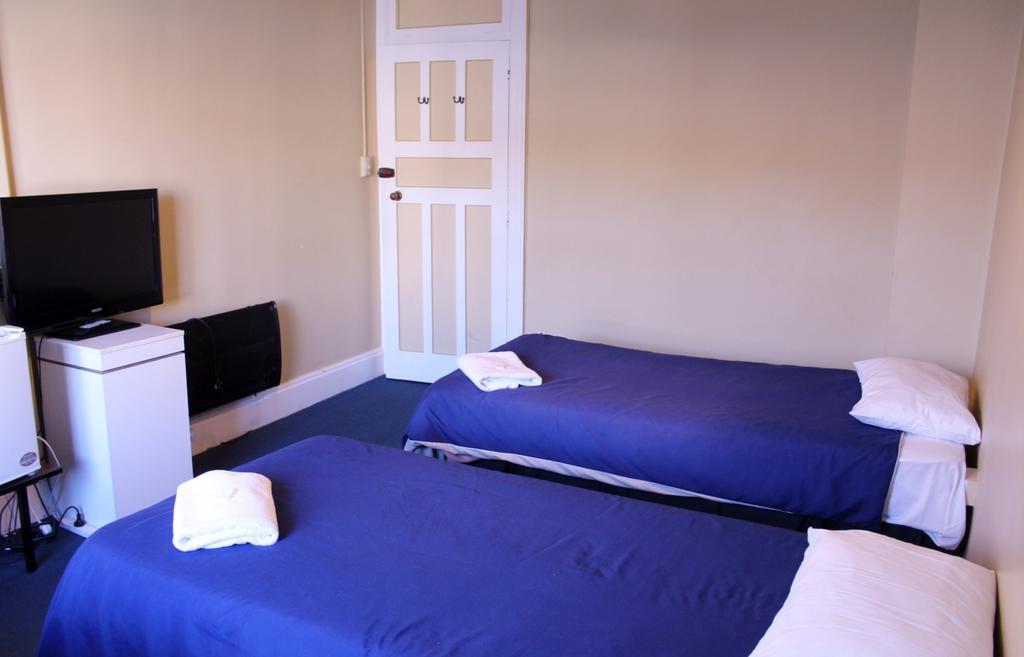 New City Hotel Κράισττσερτς Δωμάτιο φωτογραφία